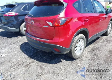 2014 Mazda Cx-5 Touring z USA, uszkodzony, nr VIN JM3KE4CY5E0318214